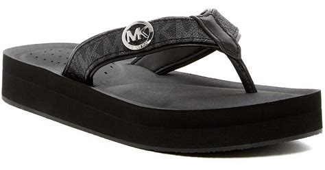 michael kors black wedge flip flops|Michael Kors black flat sandals.